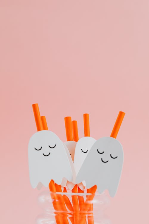 Free Cute Ghosts on Drinking Straws Stock Photo