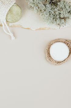 A calming flat lay showcasing minimalist spa essentials and natural decor with ample copy space.