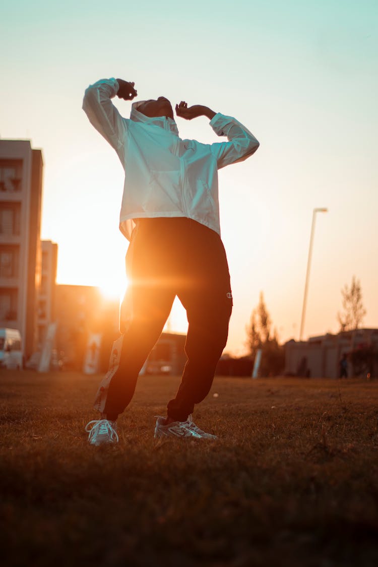 Man In Sport Clothing At Sunset