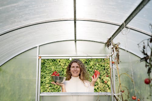 A Woman Harvesting Vegetables