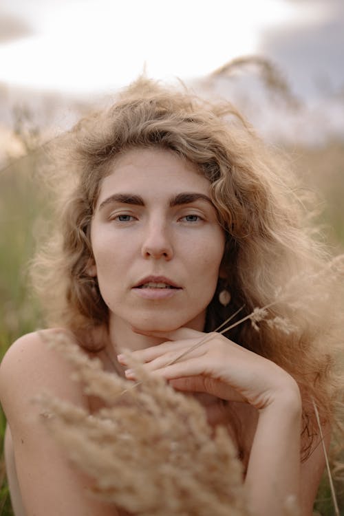 Close-Up of a Beautiful Woman with Curly Hair