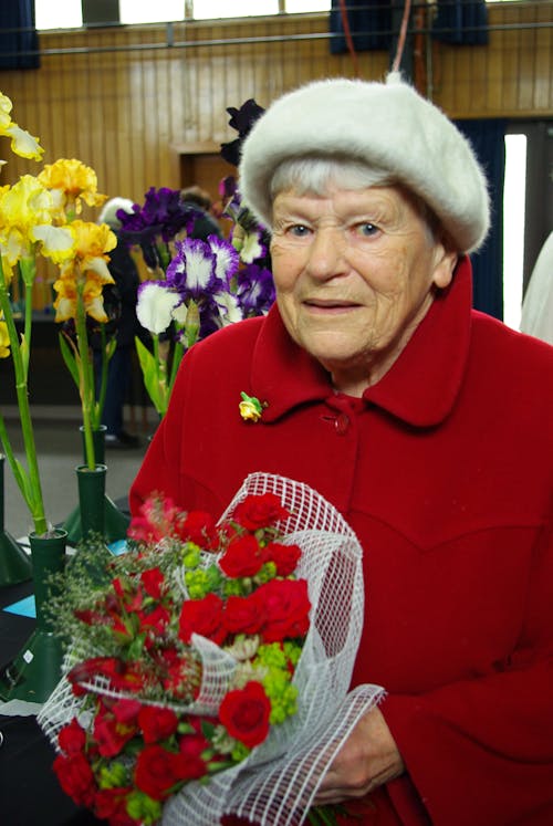 Free stock photo of old lady at flower show Stock Photo
