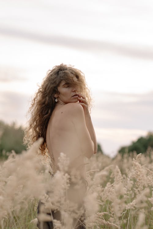 Sensual Naked Woman Posing in Wheat Field