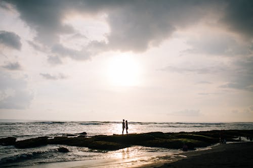 Couple Standing on Beach Together