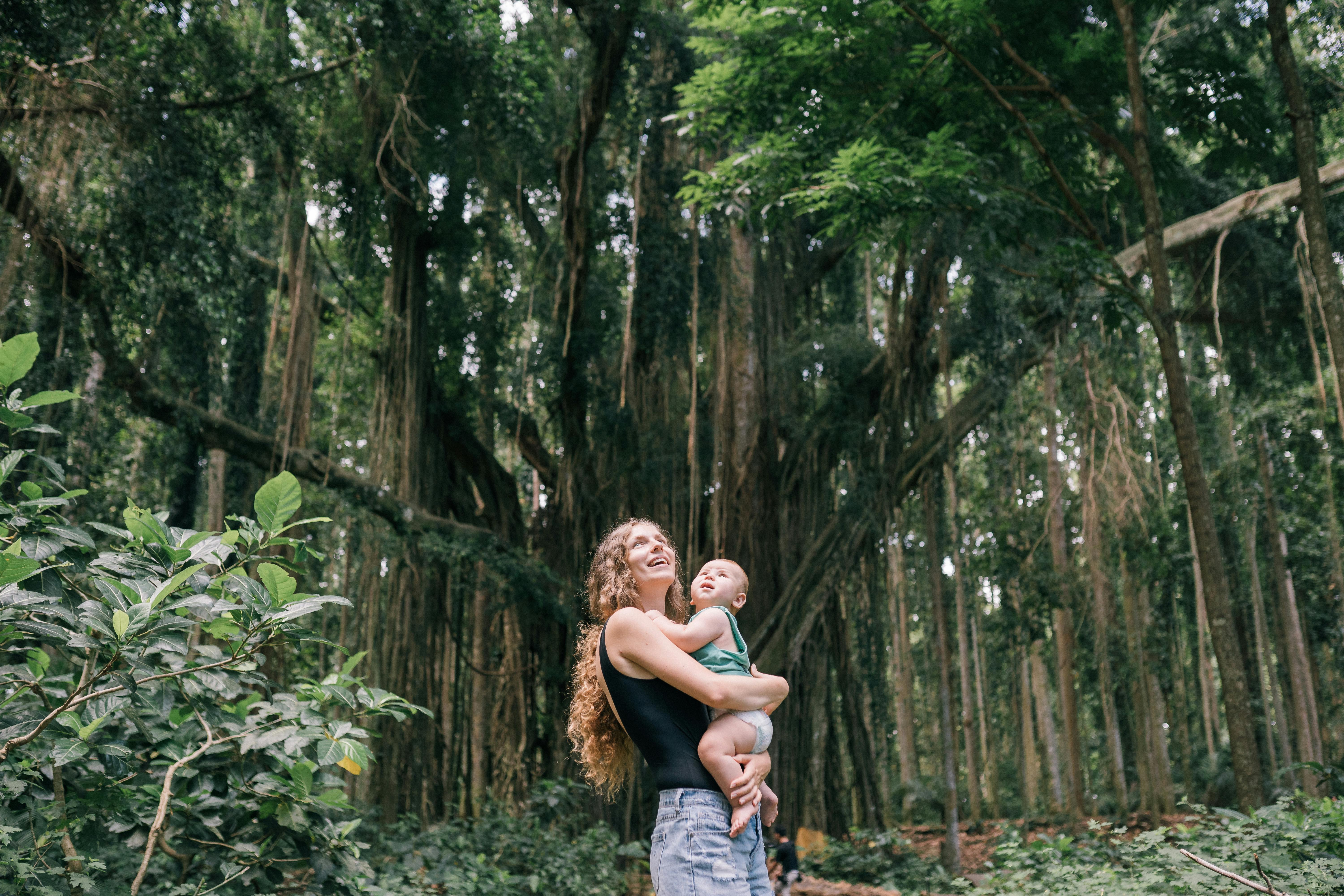 a woman carrying her child