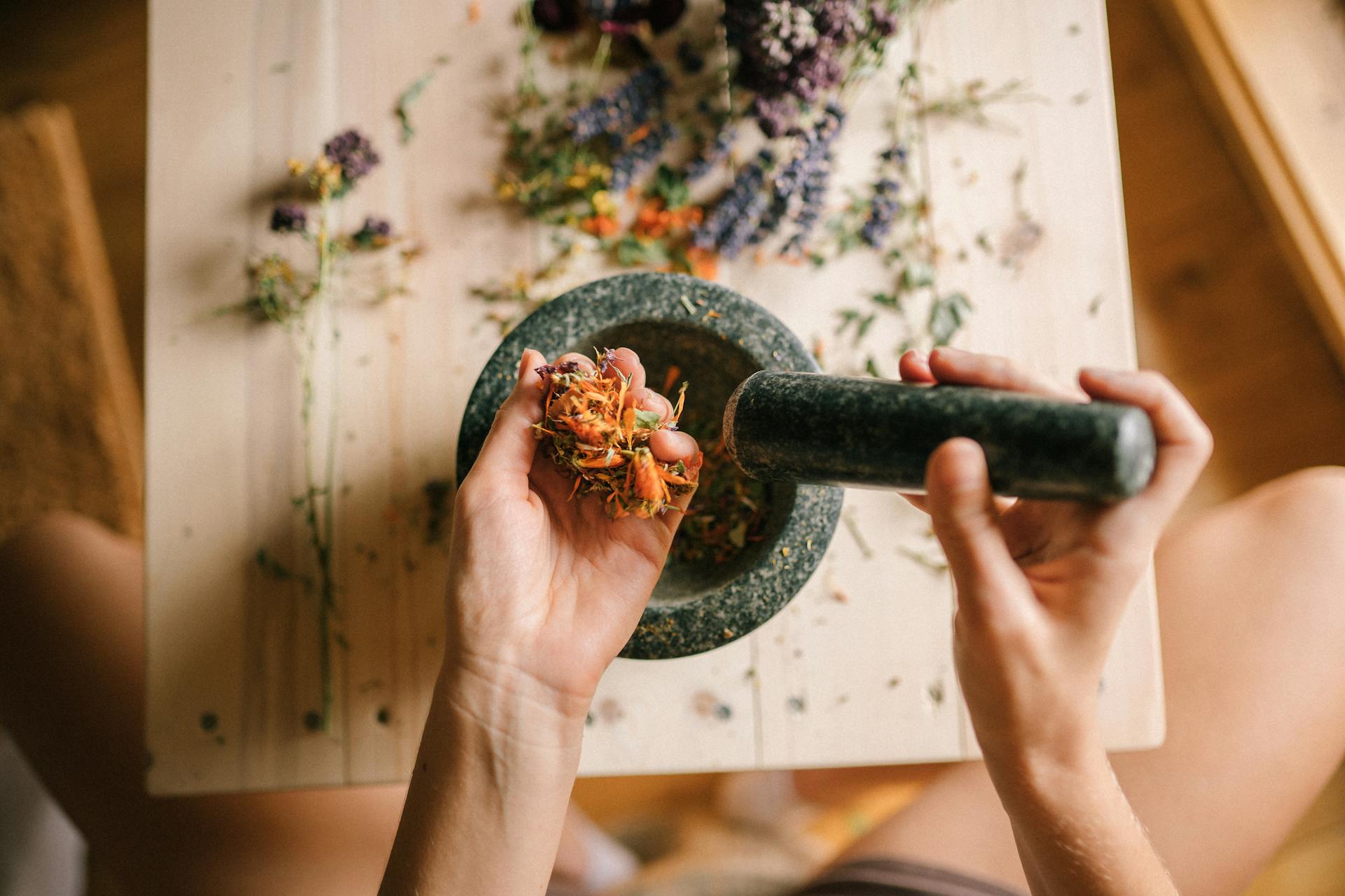 Pounding Dried Flowers with Mortar and Pestle