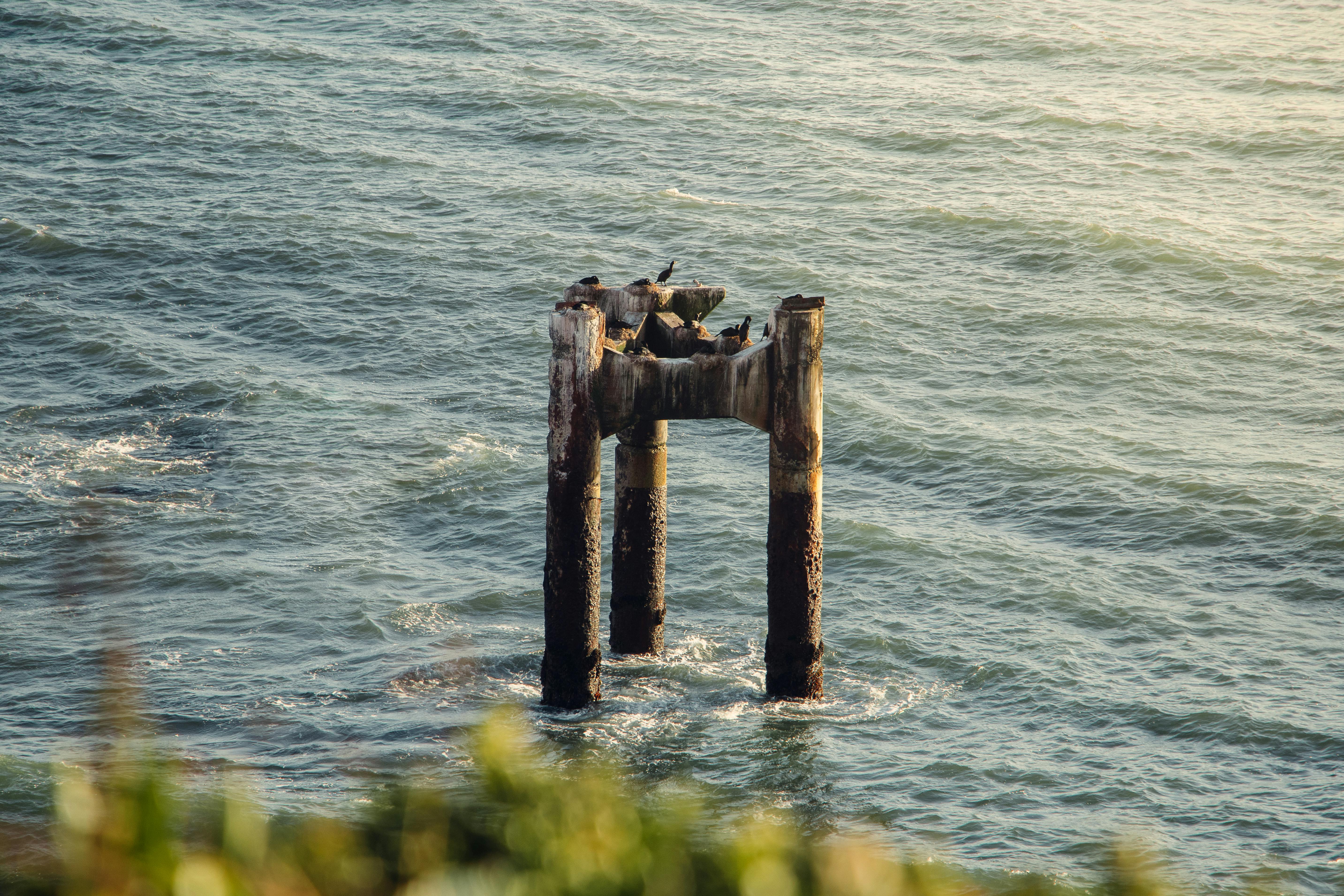 A group of diverse colleagues collaborating in a light and bright office space.
