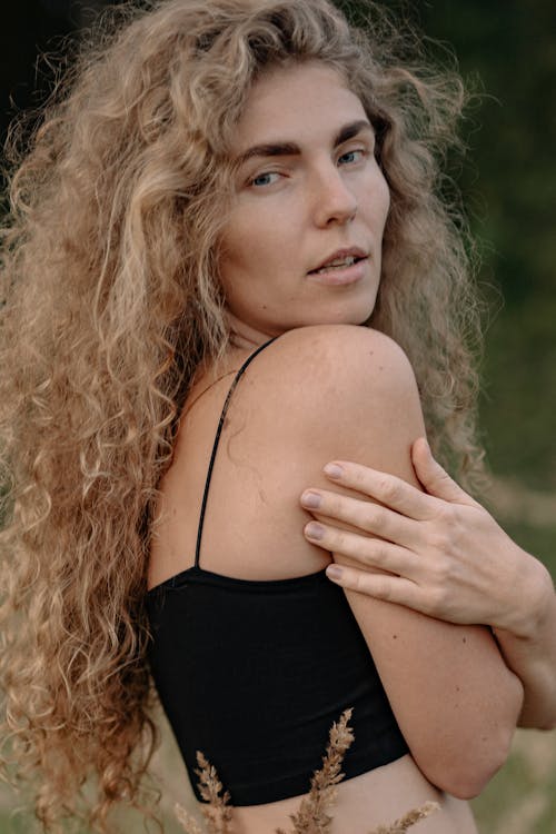 A Woman with Curly Hair