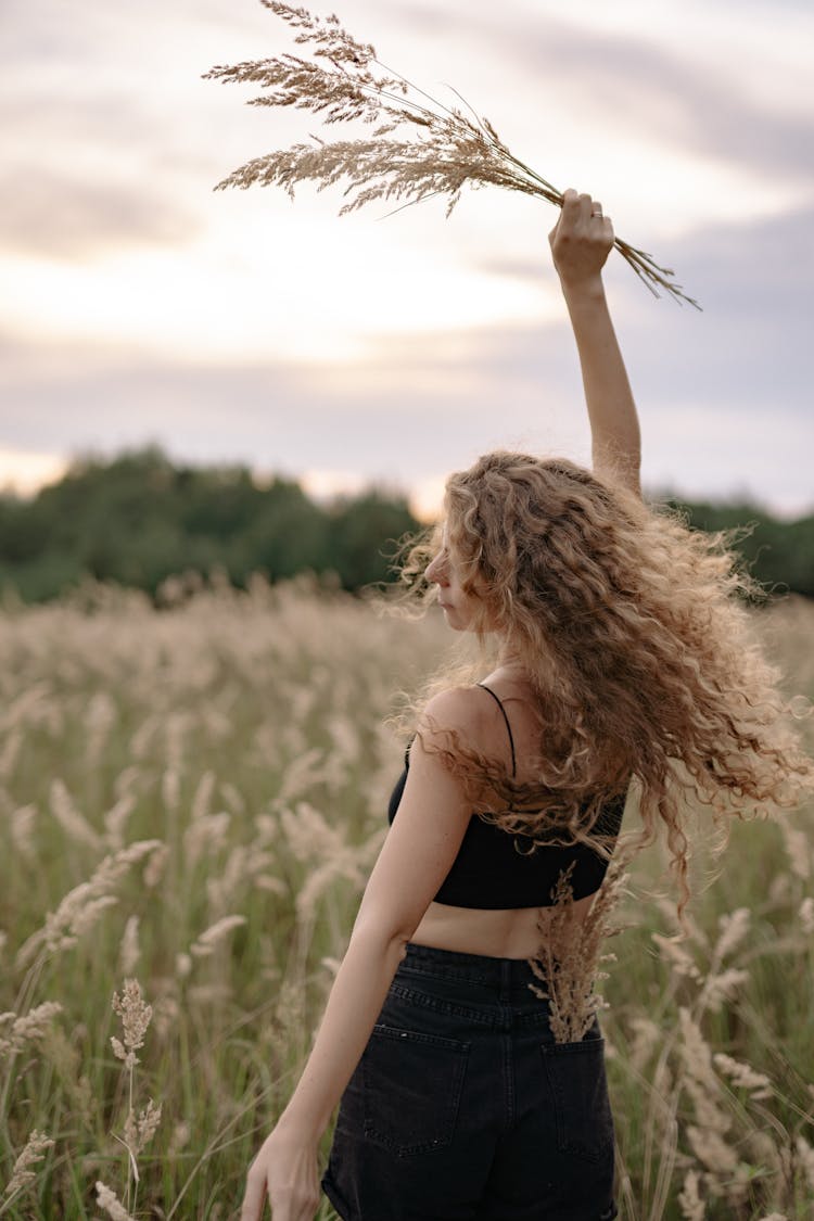 Woman Dancing In Wheat Field