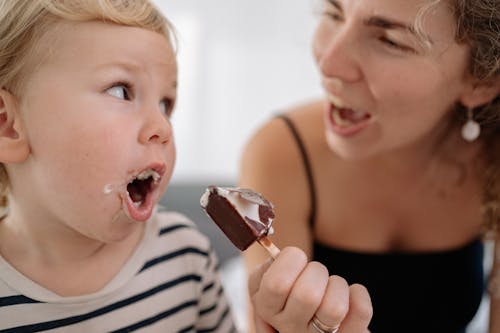 Free A Child Eating Ice Cream Stock Photo