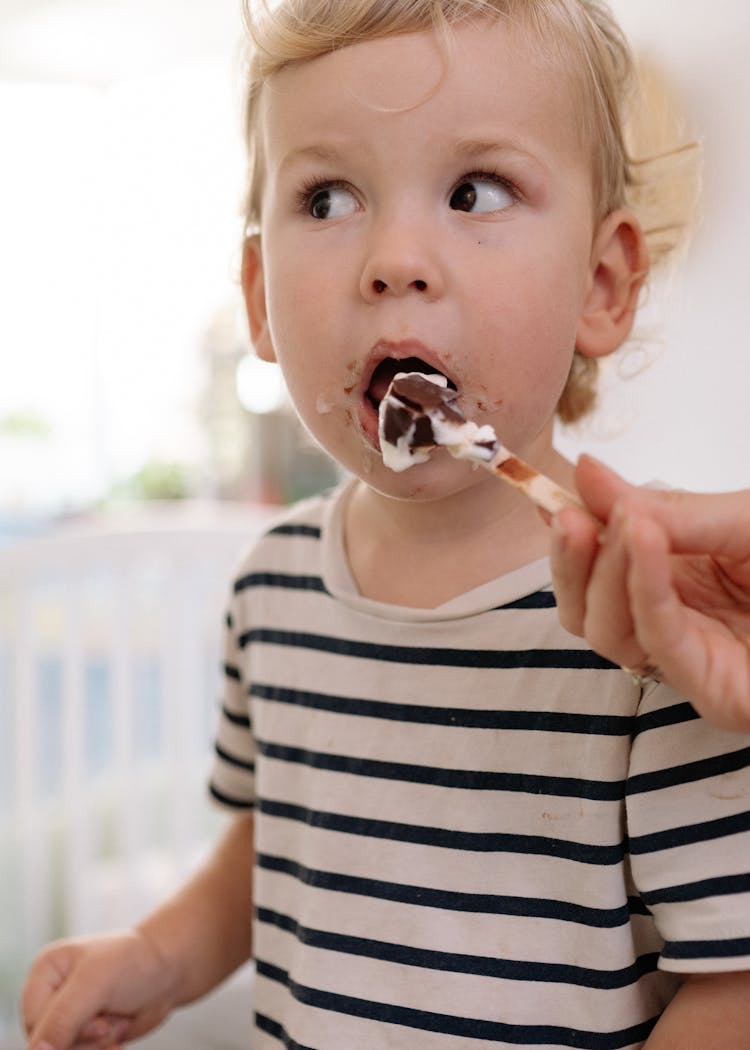 A Child Eating Ice Cream