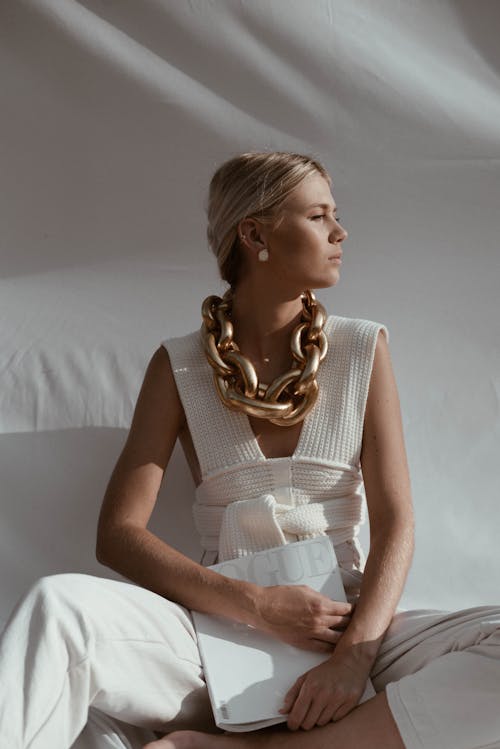 Free Fashionable Woman with Huge Gold Chain on her Neck Stock Photo