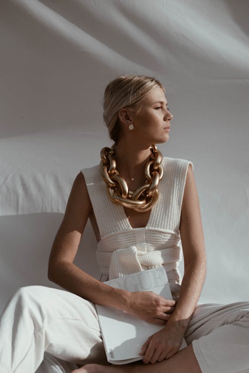 Fashionable woman with huge chain on neck