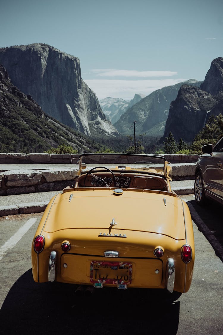 Vintage Car On Parking In Mountains