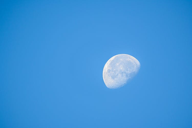 White Moon On Blue Clear Sky