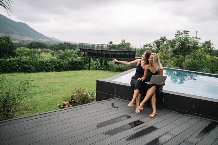 Women Looking At The Mountain View