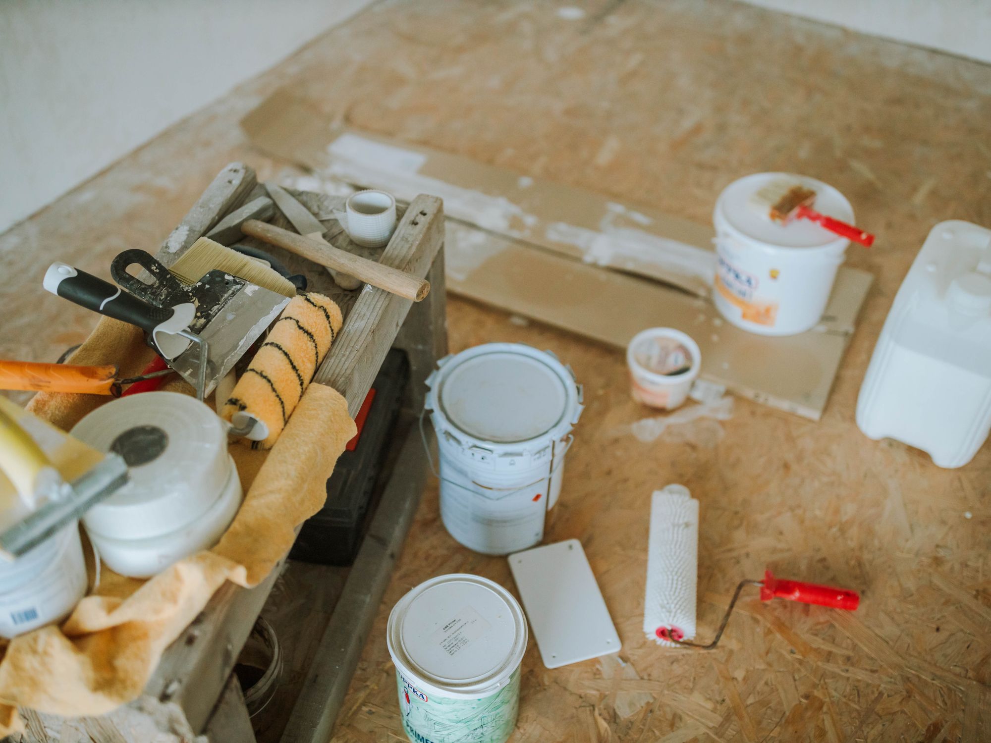 Masonry and Render Painting in Belsize Park, Camden — professional painter and decorator at work