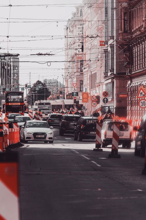 Free A bustling city street in Riga, Latvia, filled with traffic and urban life. Stock Photo