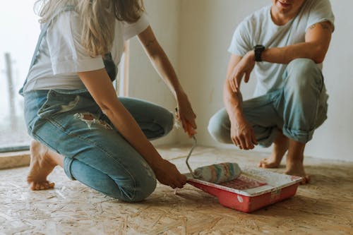 Man and Woman Doing Home Painting