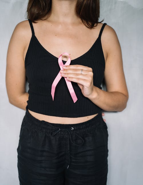 Free Woman Holding Pink Ribbon Stock Photo