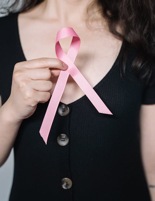 Woman Holding Pink Ribbon