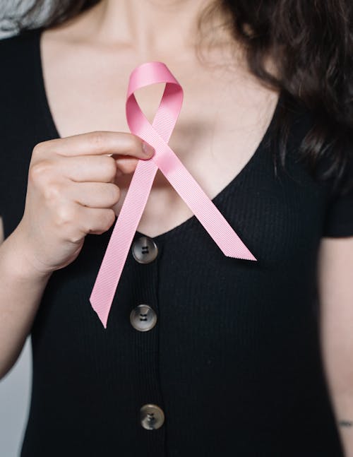 Free Woman Holding Pink Ribbon Stock Photo