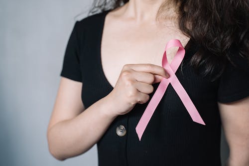 Woman Holding Pink Ribbon