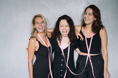 3 Women Laughing Together