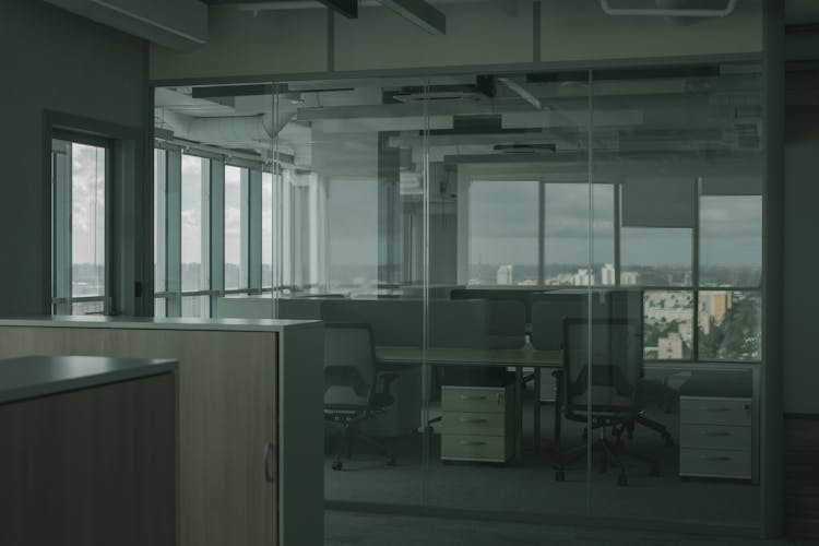 Black Rolling Chairs Beside Desk