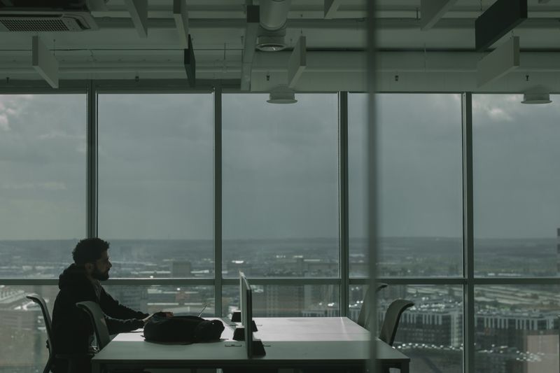 Founder at work (placeholder image, swap for a real photo)