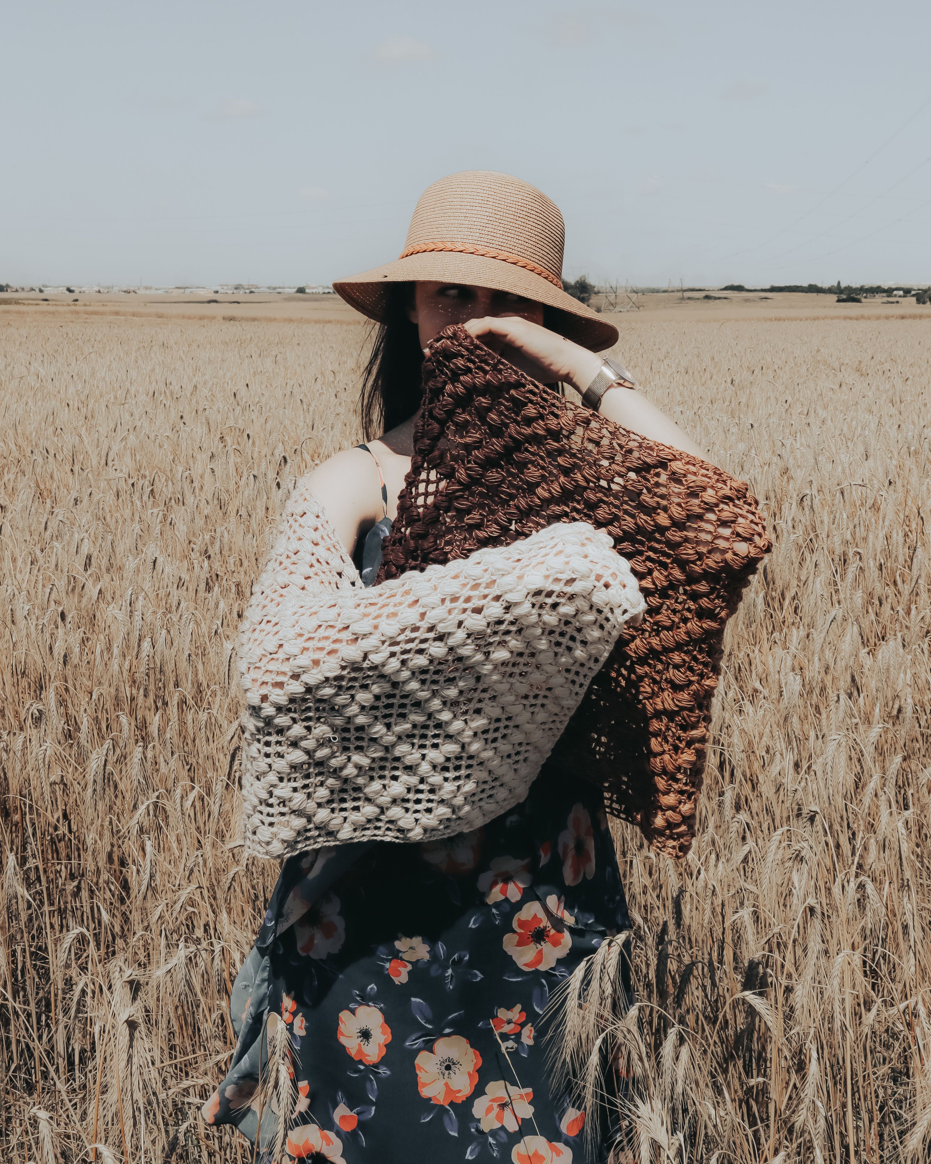 Woman in Floral Dress Standing on Grass Field · Free Stock Photo
