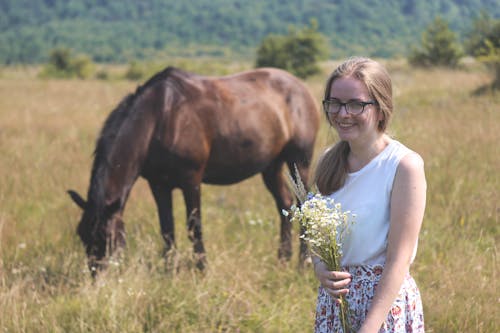 Free stock photo of field, field of flowers, girl