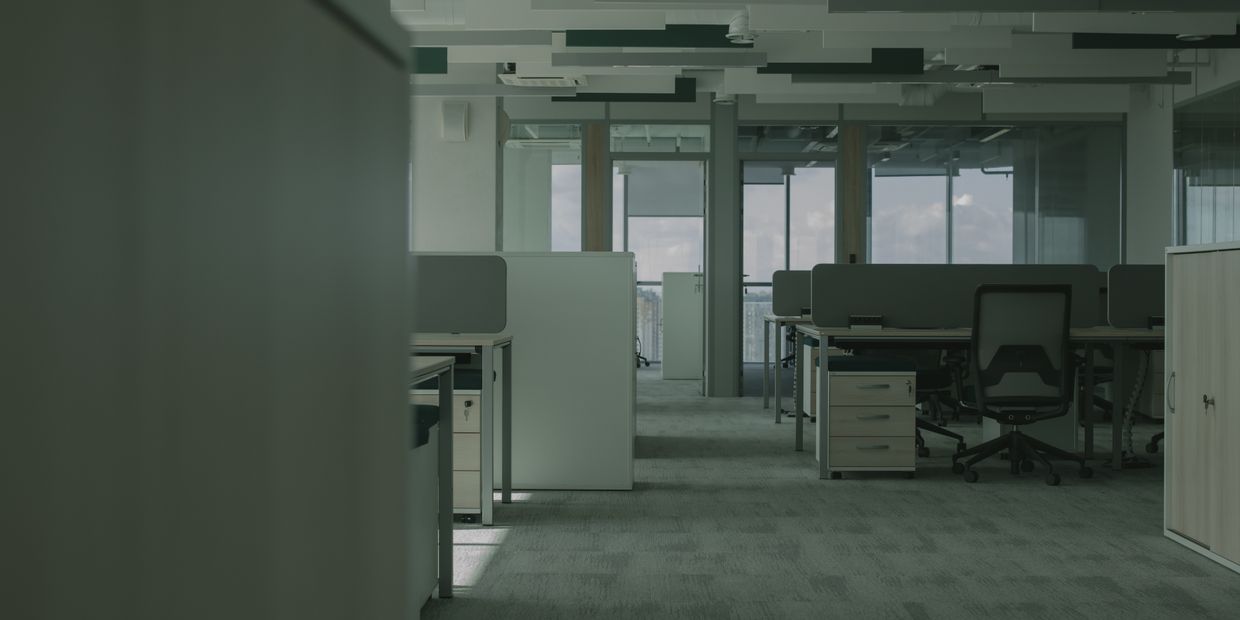A bare open-plan office before restructure