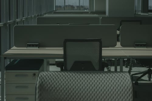 Black and Gray Office Chair Beside the Table
