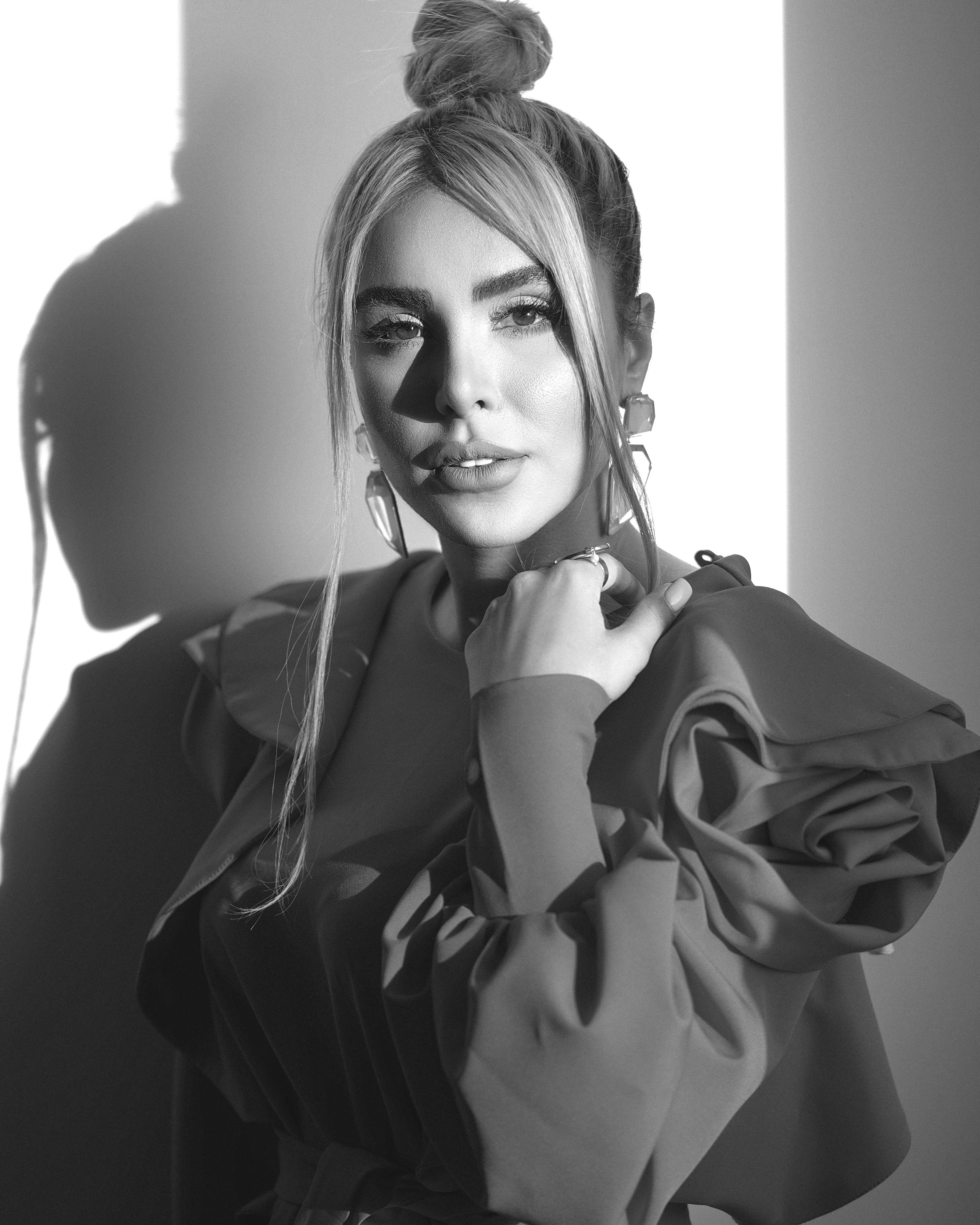 Elegant black and white portrait of a woman with stylish hair and fashion in Tehran.
