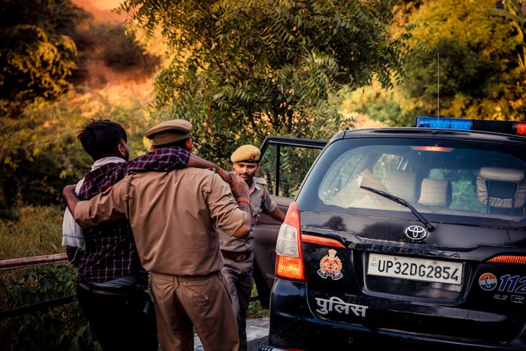 Police Officers And Police Car