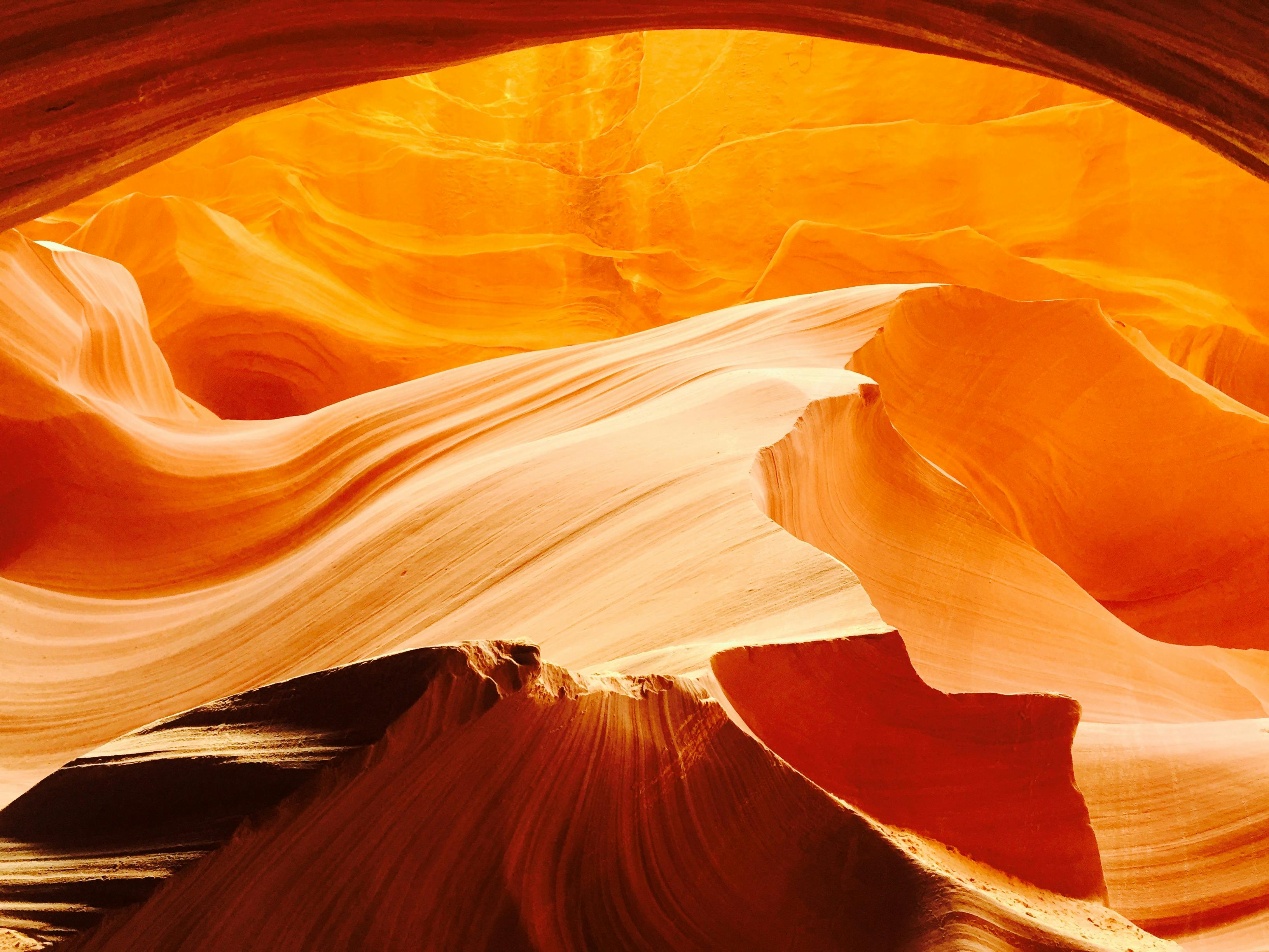 rock formation lit by daylight casting shadows