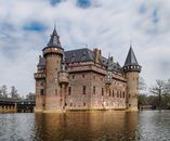 Brown Concrete Castle Near Body of Water