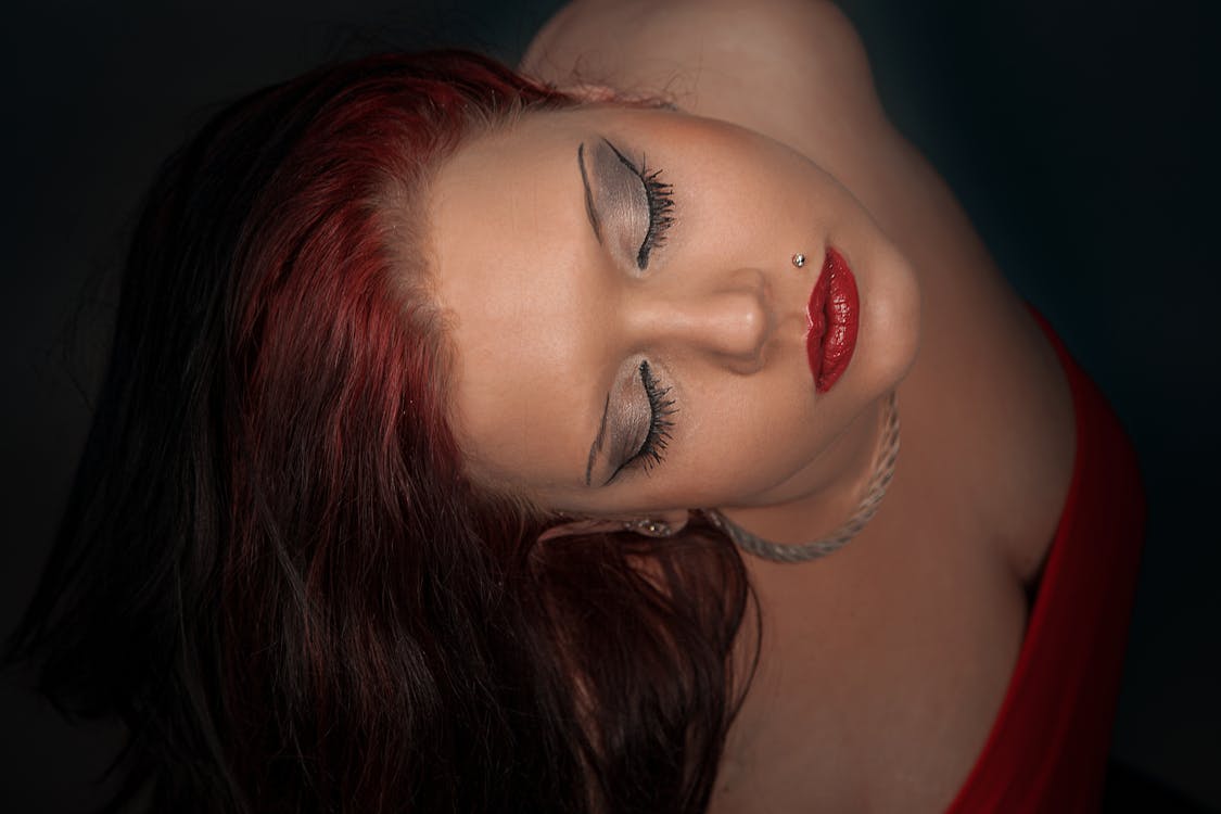 Free Woman With Red Hair Wearing Silver Necklace Stock Photo