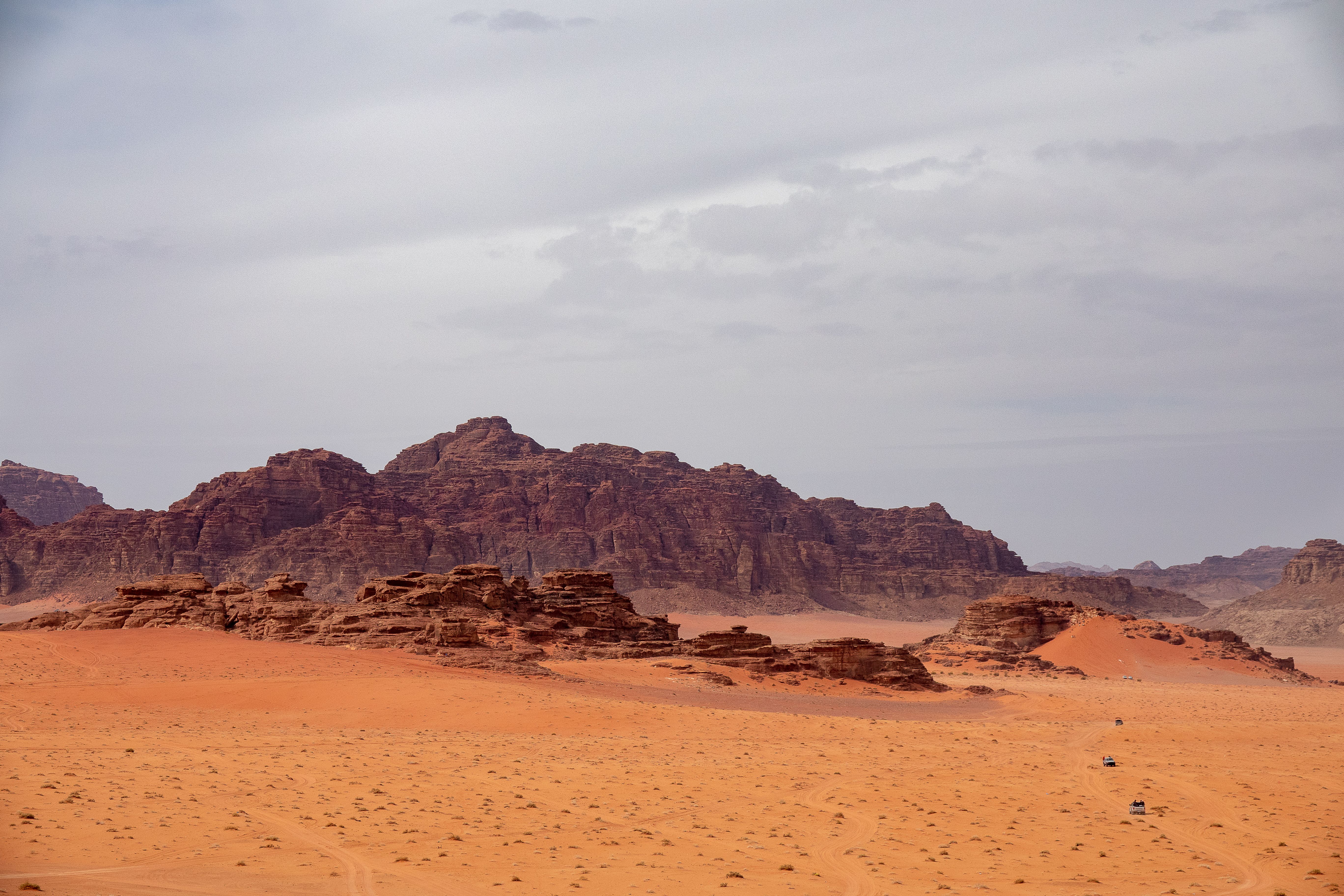 A Rock Mountains in a Desert Under Gray Sky · Free Stock Photo