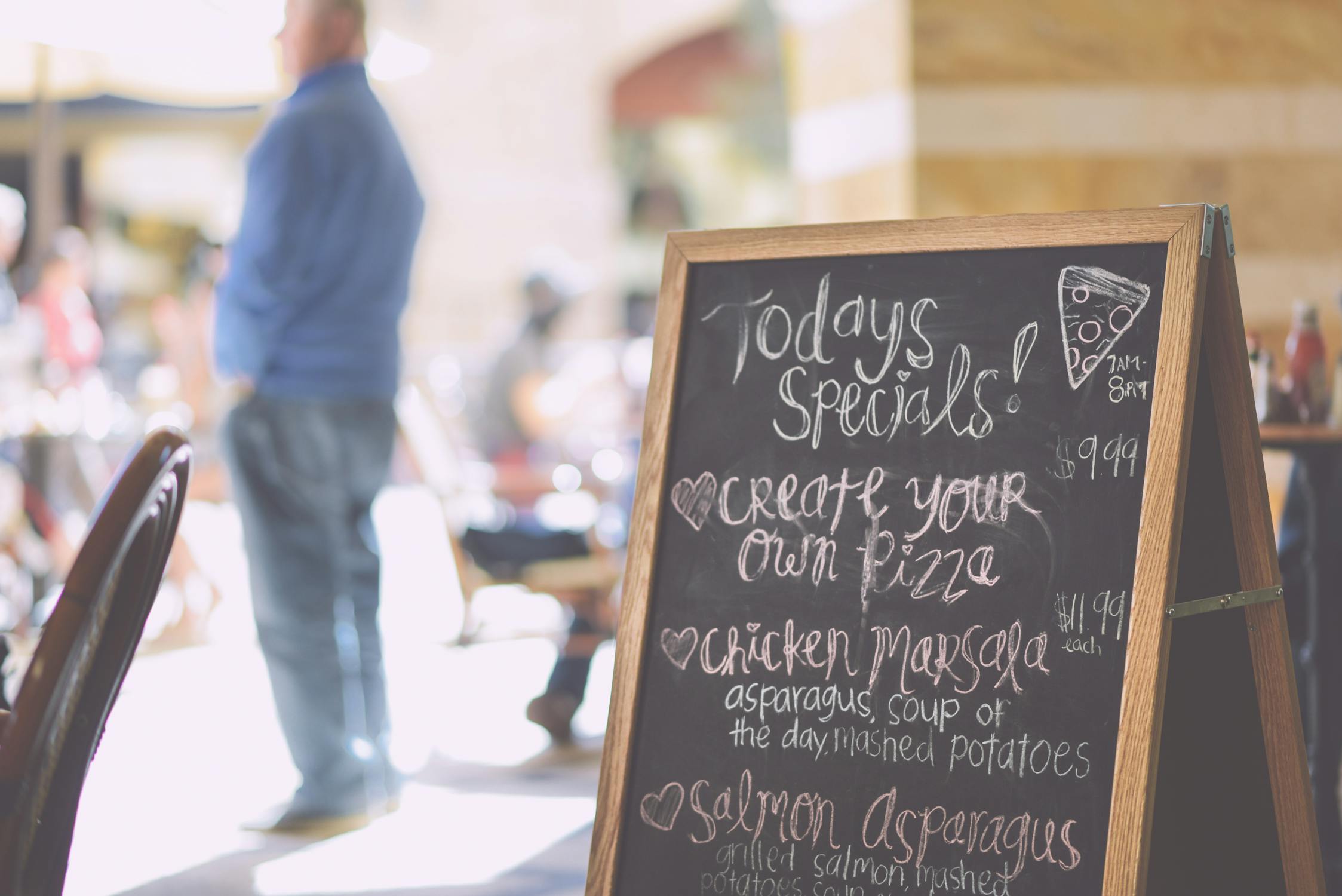 A restaurant menu with specials on it - a fun sign like you might find in your new neighborhood.