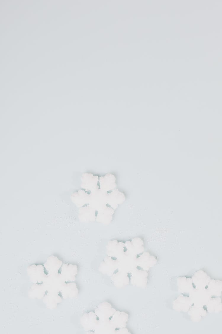 White Snowflakes On White Surface