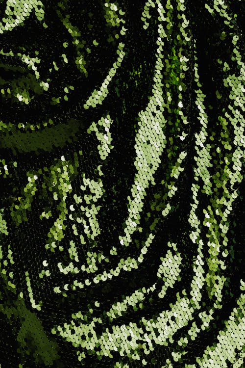 Close Up Shot of Green Sequins