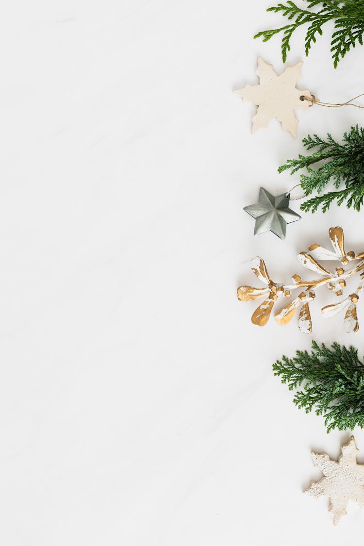 Christmas Ornaments Against A White Background