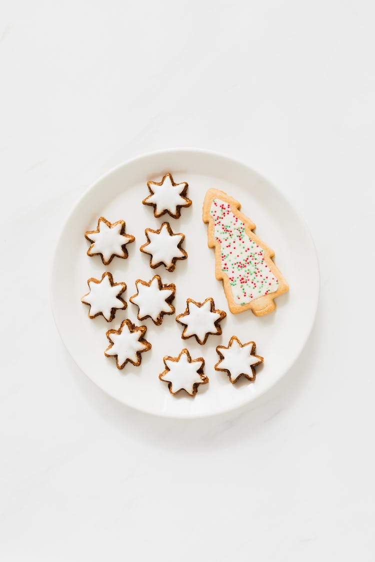 A Plate Of Cookies On A White Background