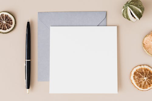 Blank Paper on Top of an Envelope