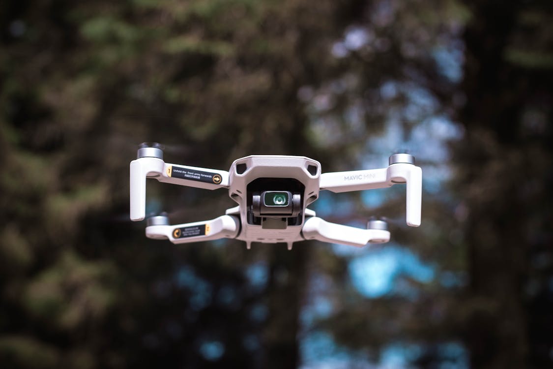 Free White and Black Drone in Tilt Shift Lens Stock Photo