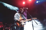 A Man Playing a Electric Guitar