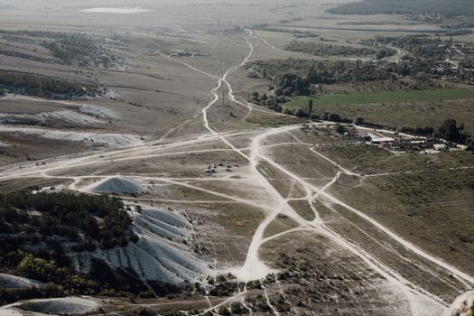 High Angle View of Barren Land and Dirt Roads