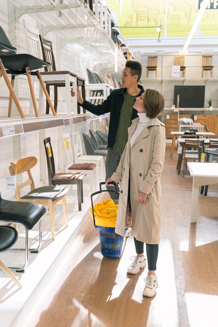 Man And Woman In Furniture Shop 